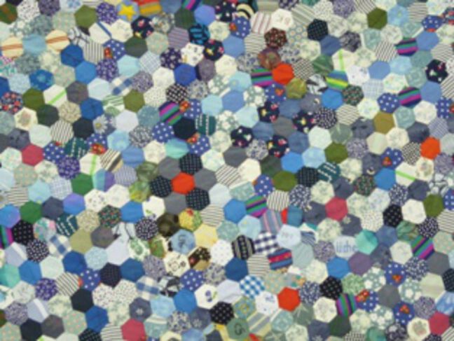 patchwork quilt at a stall nearby patchwork quilt at a stall nearby